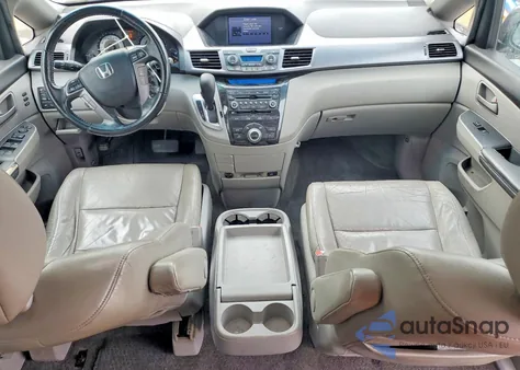 2012 Honda Odyssey Touring z USA, uszkodzony, nr VIN 5FNRL5H9XCB043913